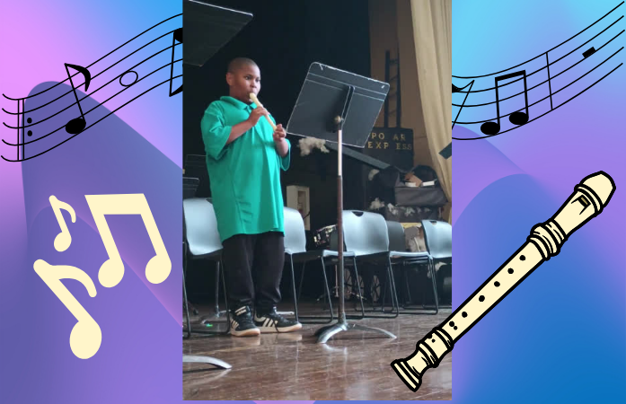  Student playing recorder on stage